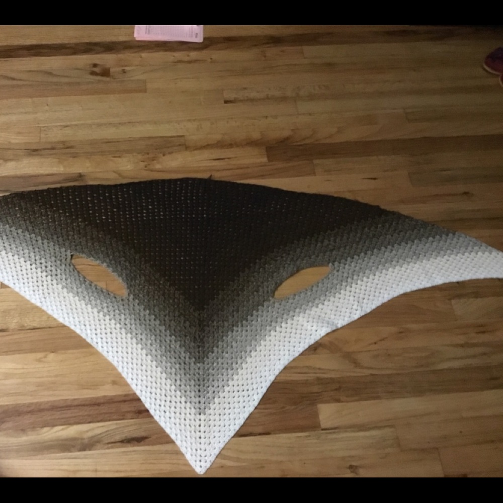 Crocheted wrap with armholes